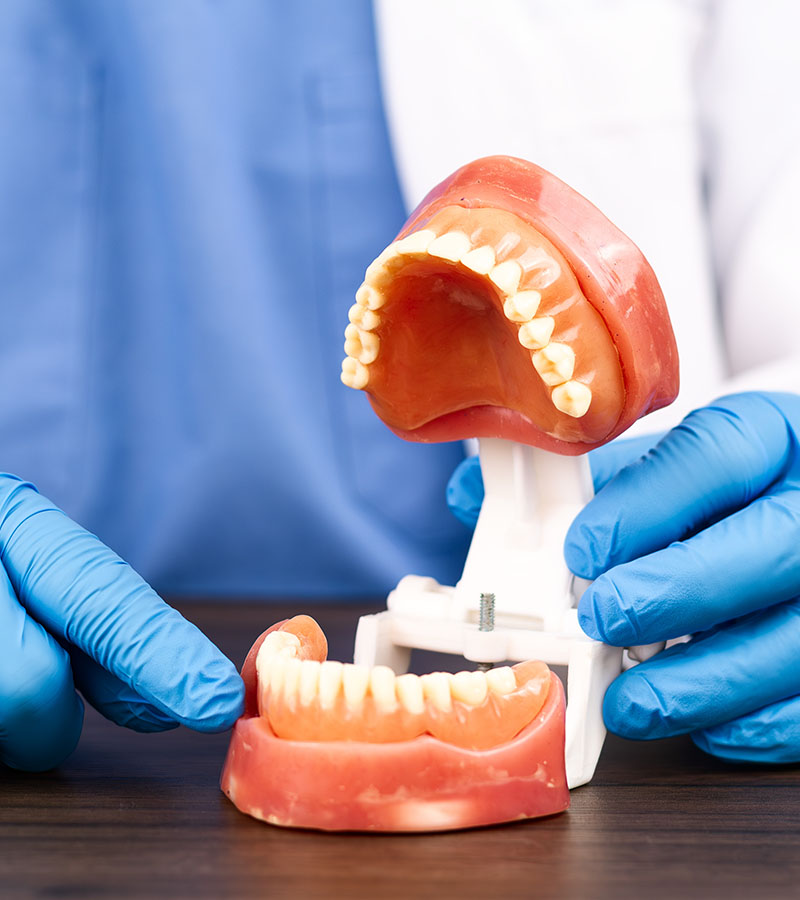 Patient receiving restorative dentistry consultation in Deerfield Beach dental office