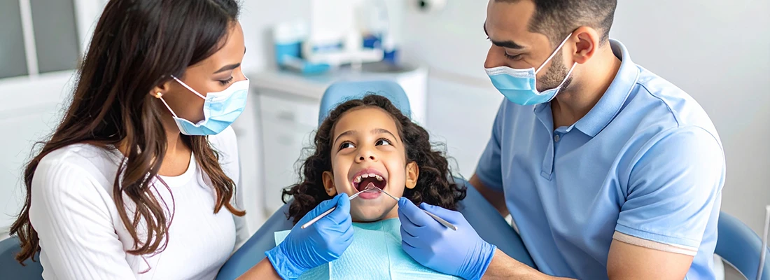 Family receiving dental care together in Deerfield Beach office